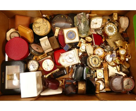 A collection of miniature novelty clocks, together with bedside alarm clocks, having manual and quartz movements, in one box.