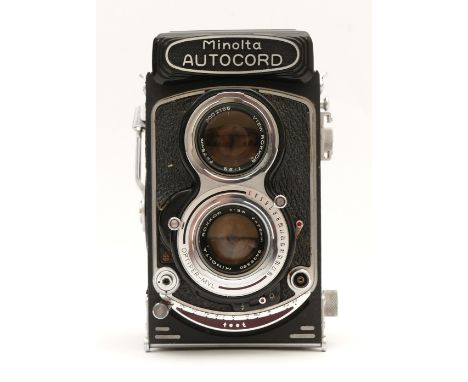 A Minolta Autocord TLR camera, with Rokkor f/3.5 75mm and f/3.2 75mm lenses, in case.