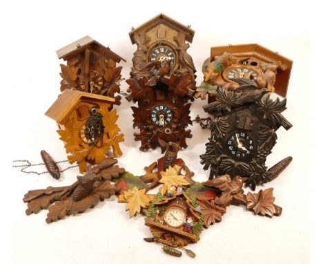 A collection of six Black Forest cuckoo clocks, having manual wind movements, in one box.
