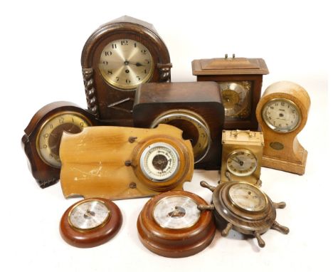 A collection of mid 20th century and later mantel clocks, having manual wind and quartz movements, in two boxes. (2)