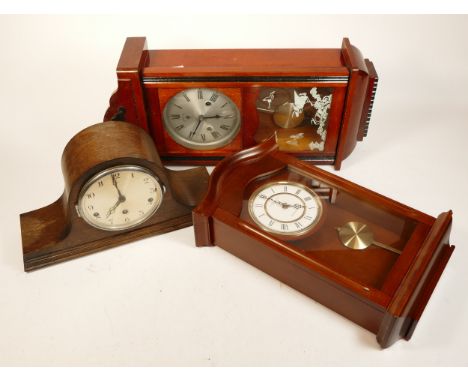 A mahogany wall clock, circa late 20th century, having 15 day movement striking on gong, 58cm long, together with a Westminst