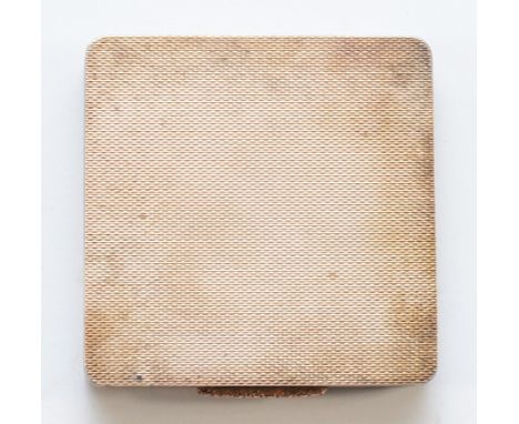 A silver compact, Birmingham 1939, with gold thumbpiece, hinged internal cover, broken glass no powder puff, 5.5x 5.5cm, 99gm