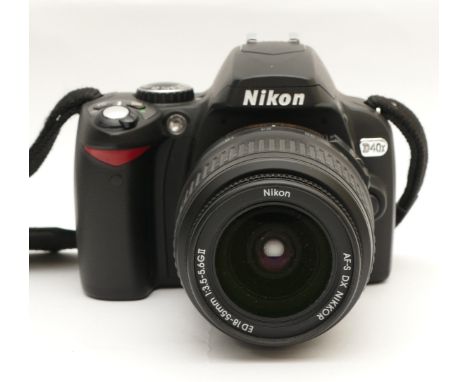 A Nikon D40x digital SLR camera with a Nikon AF-S f/3.5-5.6 18-55mm lens.