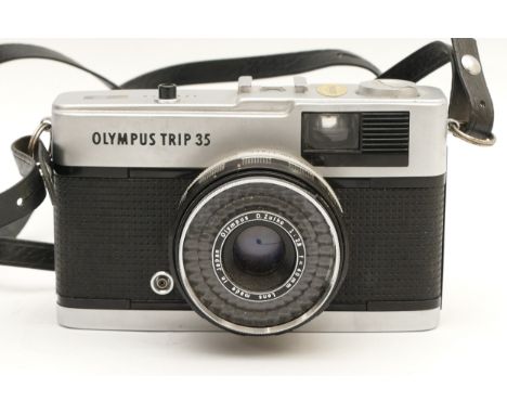 An Olympus Trip 35 camera with Olympus Zuiko f/2.8 40mm lens.