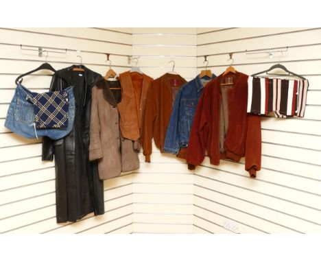 A long, black leather button coat, with single back vent, front flap pockets, lined. Chest 86cm, length 122cm, a worn sheepsk