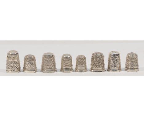 A silver thimble, by Charles Horner, Chester 1907 and seven other silver thimbles, 27gm