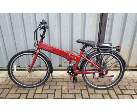A burgundy coloured E-Lise e-bike with charger and operator manual