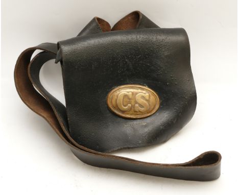 An American black leather ammo shoulder Bag, having broad shoulder strap, the flap with brass button fastener and attached ov