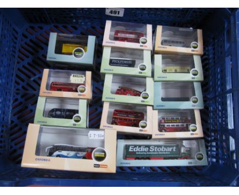 Thirteen Oxford "N" Gauge Cased Diecast Vehicles, all commercial vehicles, London Decals fire engine noted, very good.
