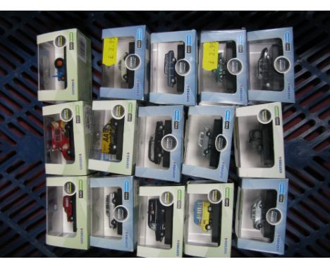 Fifteen Oxford "N" Gauge Cased Diecast Vehicles; cars, small vans, blued Fordson tractor noted, very good.