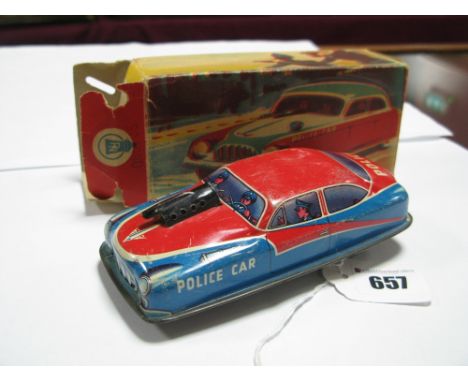 A Post War Tinplate Friction Drive Police Car, by P.N. of Western Germany, fair, boxed.