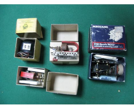Two Meccano Electric Motors, an EO2O and an E15R both boxed, plus two Danbury Motors, boxed.