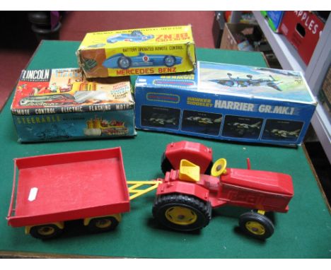 Four Circa 1960's and Later Plastic Model Toys, including Leyland Tractor and Trailer, battery operated Hawker Siddely Harrie