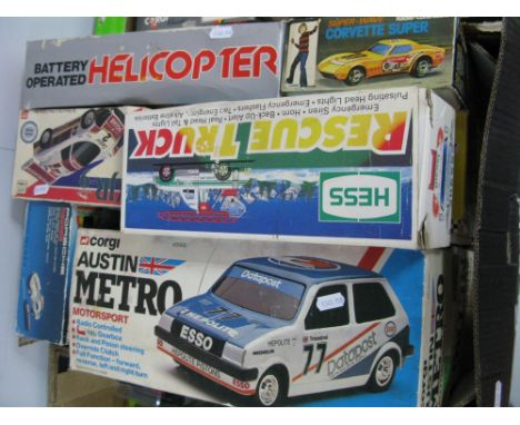 Eight Plastic Model Battery Operated, predominately radio controlled vehicles, by Corgi, Bandai Radio Shack, Hess and other i