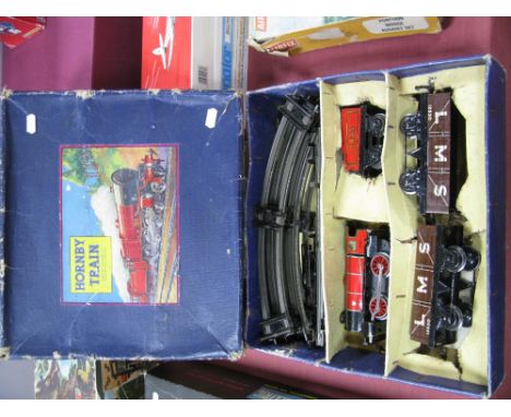 A Hornby 'O' Gauge/7mm Pre War M1 Goods Train Set, boxed, comprising 0-4-0 steam locomotive and four wheel tender, red R/No 3