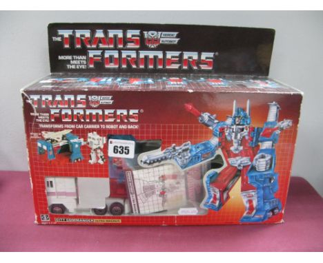 A Hasbro (circa 1985) The Transformers Heroic Autobot City Commander Ultra Magnus, transforms from car carried to robot and b