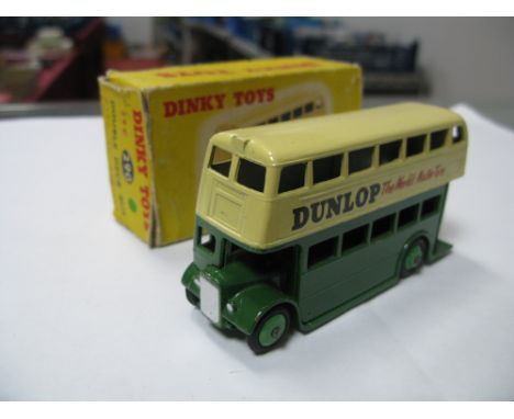 Dinky Toys 290 - Double Decker Bus, cream over green 'Dunlop', overall very good, boxed, small tears, crushing, staining to b