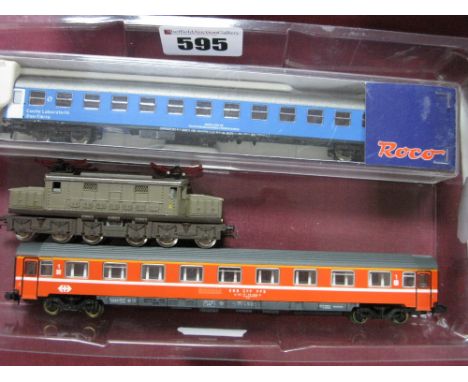 An "N" Gauge Electric Twin Pantograph Locomotive R/No LE 026.131, good unboxed condition, plus two "N" Gauge coaches, cased R