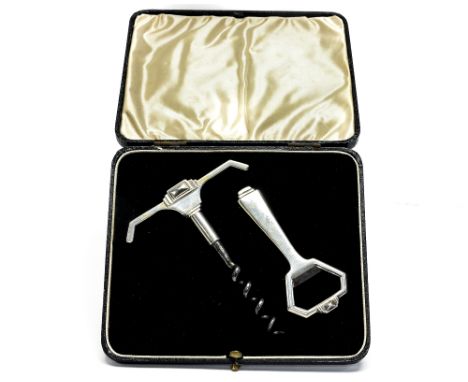 An Art Deco silver bar tool set, angular design, including crokscrew and bottle opener, William Suckling, Birmingham 1933, in