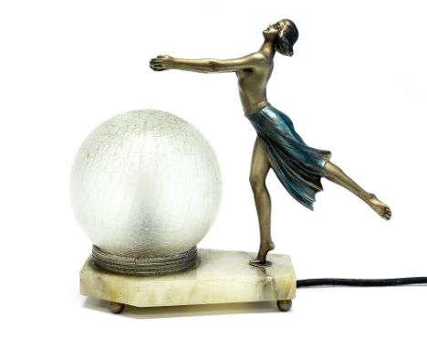 An Art Deco figural lamp, the semi clad female dancer, next to a glass spherical shade on alabaster base, 20cm high
