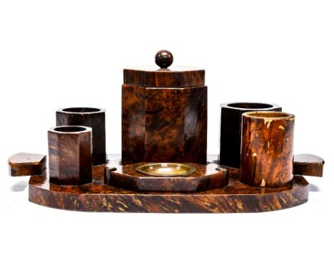 An Art Deco burr walnut desk stand, angled form including various pots and ashtray