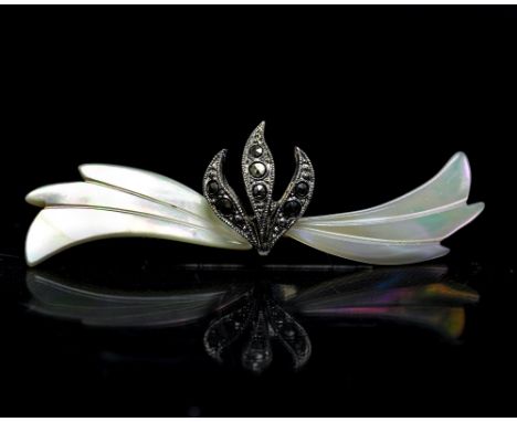 An Art Deco mother of pearl and marcasite set bar brooch, foliate design, 5.5cm wide