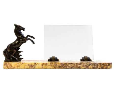 An Art Deco bronzed figural photo frame, modelled as a bucking horse next to a glass plate, on a Siena marble base, 37cm wide