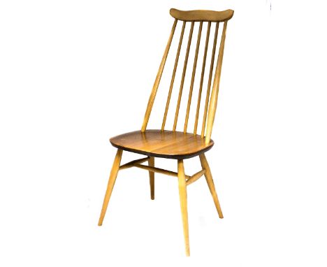 A set of four Ercol Goldsmith chairs, light elm and ash spindle back with shaped crest rails, stickers and buttons to undersi