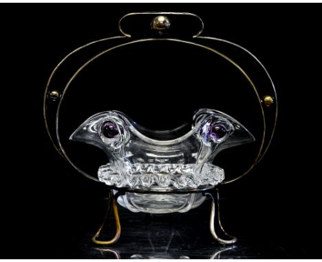 A Stourbridge peacock trail glass bowl in silver plated carrying cradle, probably by Stuart, circa 1900, the wavy rim with pu