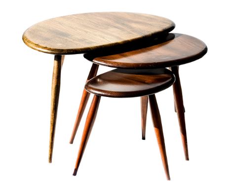 A nest of three Ercol pebble tables, stained elm and ash, the largest 65cm wide (3)