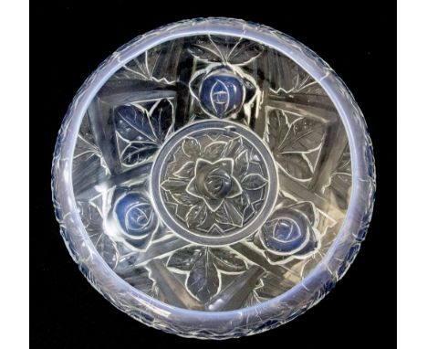 Jobling, an Art Deco blue opalescent glass bowl, shallow form with inverted rim and stylised rose and leaf motifs, moulded re