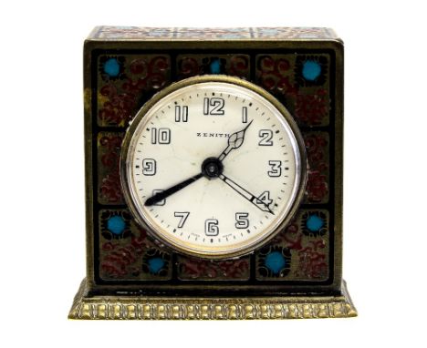 A Secessionist Zenith enamelled brass alarm clock, the white dial within a cuboid case decorated with blue and red geometric 