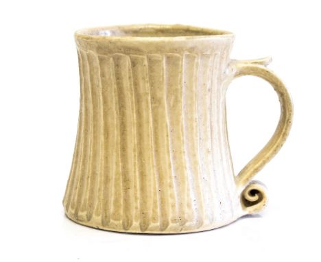 Jeremy Leach, a studio pottery mug, circa 1952, waisted cylinder form with incised vertical fluting, JL monogram incised twic