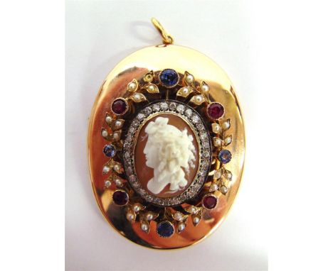 AN UNUSUAL CAMEO & GEM SET LARGE OVAL LOCKET the shell carved as a classical female in profile enclosed by thirty one brillia