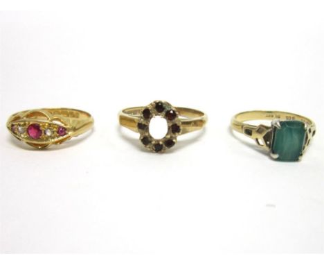 A DIAMOND AND RUBY 18 CARAT GOLD RING Birmingham 1913, finger size J, 2.3g gross; with two stone set dress rings, one 9 carat