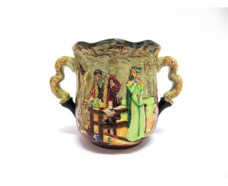 A ROYAL DOULTON LIMITED EDITION LOVING CUP 'THE APOTHECARY' c. 1934, modelled by Charles J Noke and Harry Fenton, signed in t