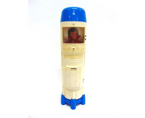 A 'SIX MILION DOLLAR MAN' ACTION FIGURE and a Bionic Transport Repair Station.
