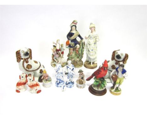A GROUP OF CERAMIC FIGURES to include Staffordshire figure of a highlander with sheep, pair of Staffordshire spaniels, contin