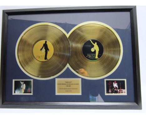 POP MEMORABILIA - MICHAEL JACKSON A 'This Is It' 24ct gold coated disc, limited edition 74/1500, framed and glazed, overall 4