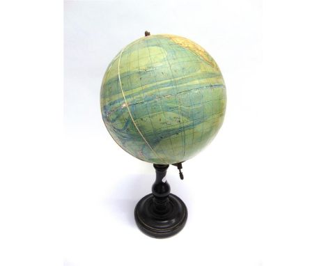 AN EARLY 20TH CENTURY TERRESTRIAL GLOBE by 'G THOMAS EDITOR 44 Rue N D Des Champs 44 PARIS', on a turned and ebonised base, 6