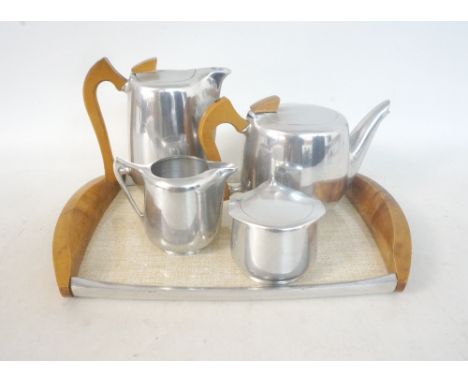 PICQUOT WARE TEA/COFFEE SERVICE
comprising teapot; coffee pot; sugar basin; milk jug and serving tray (5)