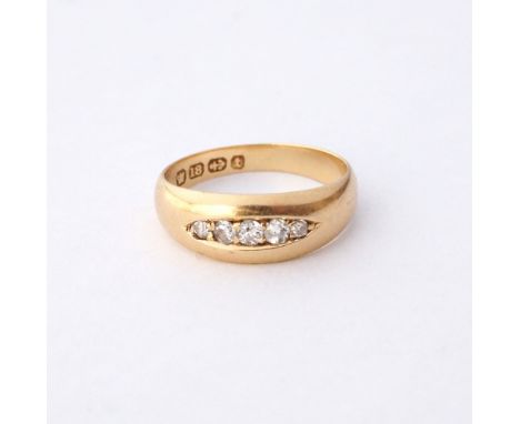 DIAMOND FIVE STONE RING
in eighteen carat gold,the diamonds totalling approximately 0.17cts, ring size K