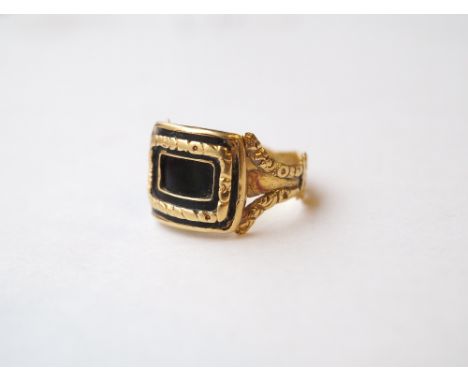GEORGIAN BLACK ENAMEL DECORATED MOURNING RING
on gold shank, engraved details to interior, ring size K