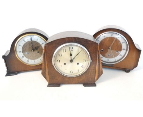 SMITHS WALNUT CASED MANTLE CLOCK
of shaped outline with a plaque 'BR Scottish Region D. BROWN In Appreciation Of 45 Years Ser