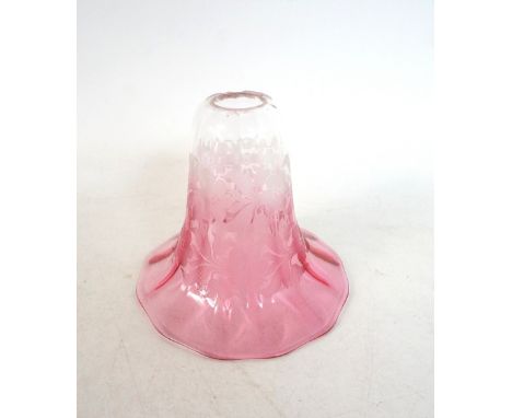 CRANBERRY GLASS LAMP SHADE 
of flared trumpet form with an etched floral design, 13cm high 