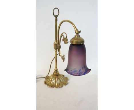 ART NOUVEAU STYLE GILT METAL LAMP
modelled as a tulip with a flowing shaped lilac glass shade and stylized body, 47cm high  