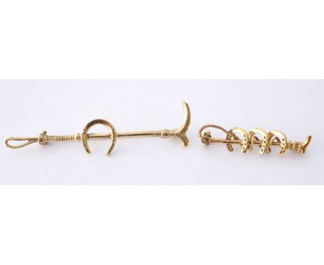 TWO SILVER GILT EQUESTRIAN INTEREST BROOCHES
one formed with a horse shoe and a riding crop, the other with three horseshoes 