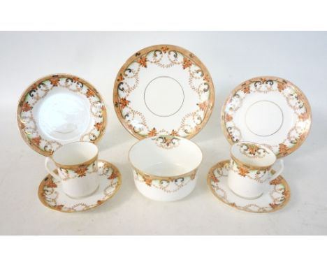 DELPHINE CHINA COFFEE SET
with floral and swag decoration on white ground, comprising eight cups, eleven saucers, twelve side