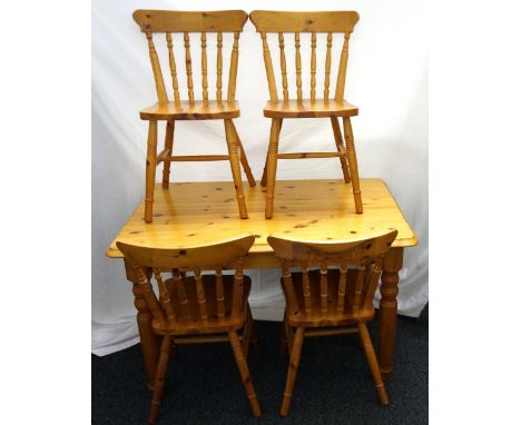 PINE KITCHEN TABLE
standing on turned supports, together with four stick back chairs