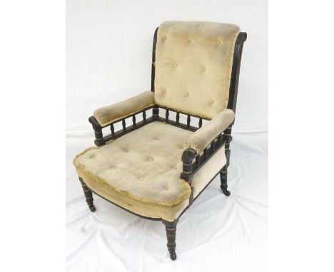 VICTORIAN ARMCHAIR
the ebonised frame with gilt detail, button back and seat with railed padded arms, taupe fabric covering, 